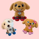 Three plush dog toys with colorful paws on a pink background